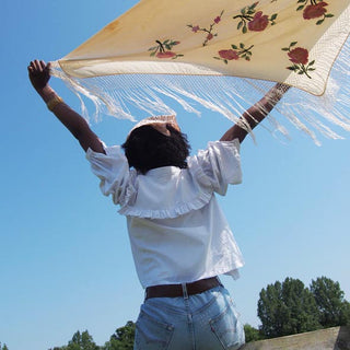 women holding festival scarf 