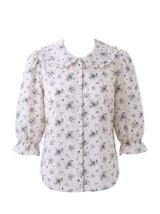 Floral blouse with puff sleeves on a white background
