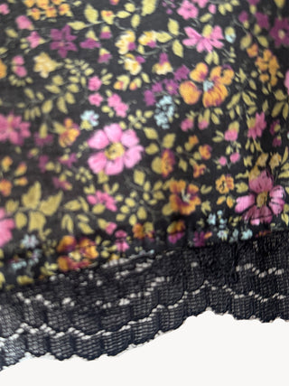 Floral fabric with a black background