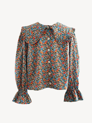 Floral blouse with long sleeves on a white background