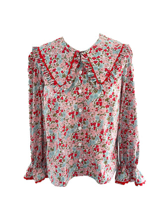 floral blouse on white backround