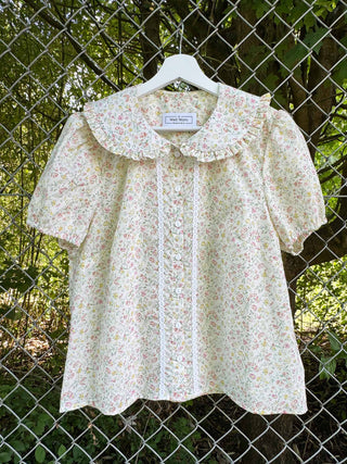 floral-bouse-on-fence