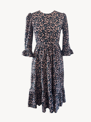 Floral patterned dress on a white background