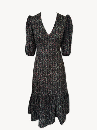 black floral dress on mannequin