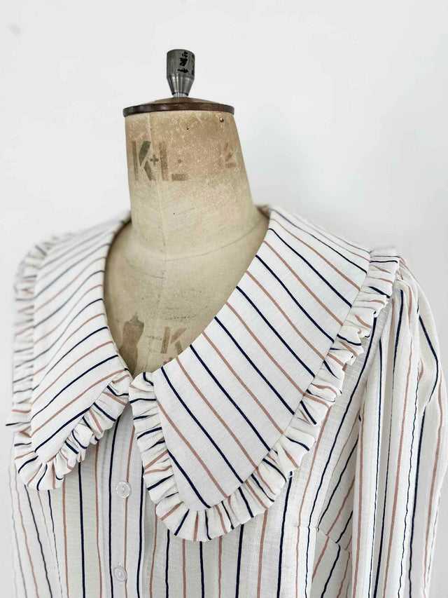 The Well Worn stripe blouse on mannequin collar detail