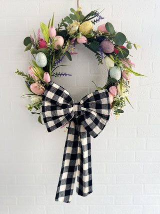 Oversized sustainable fabric bow on a spring Easter wreath, ethically handmade in the UK from deadstock materials