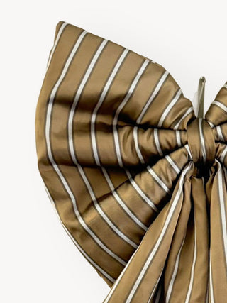 bronze bow on white background