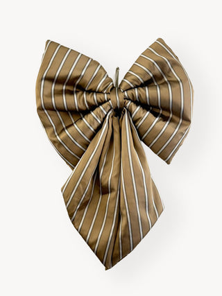 Brown and white striped bow on a white background