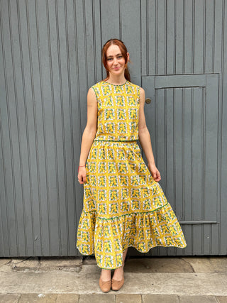 women wearing lemon print skirt front view