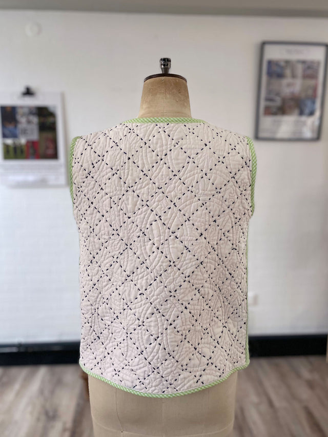The Well Worn quilted waistcoat mannequin back