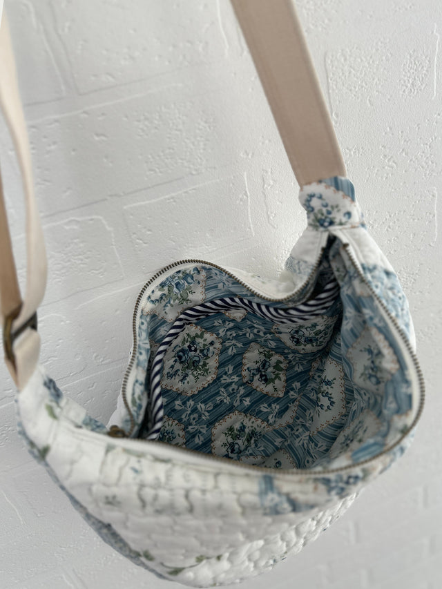 The Well Worn quilted bag on hanging on wall inside detail