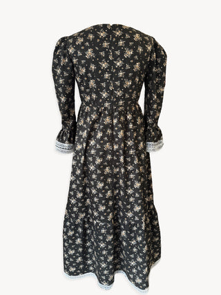 Floral dress with long sleeves on a white background