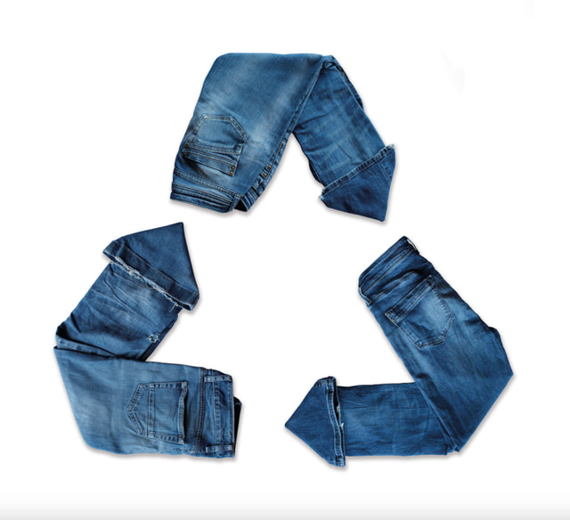 The Well Worn jeans in the shape of recycled sign