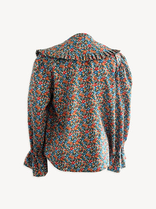 Floral patterned blouse on a white background