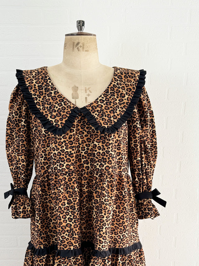 The Well Worn leopard dress on mannequin neck detail