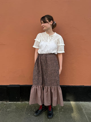women wearing checked leopard skirt