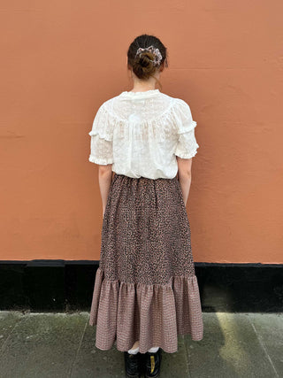 women wearing checked leopard skirt