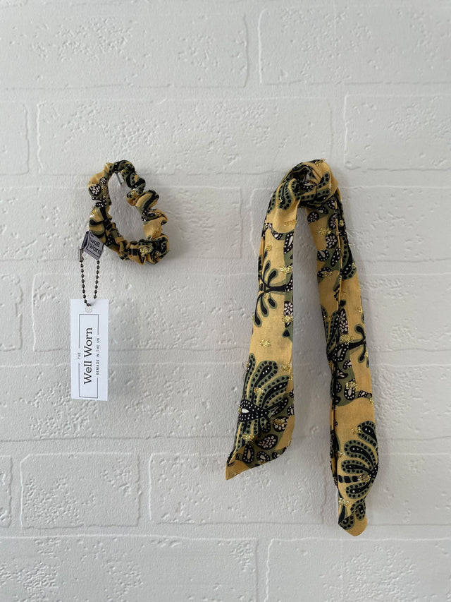 leopard print hair tie on wall 