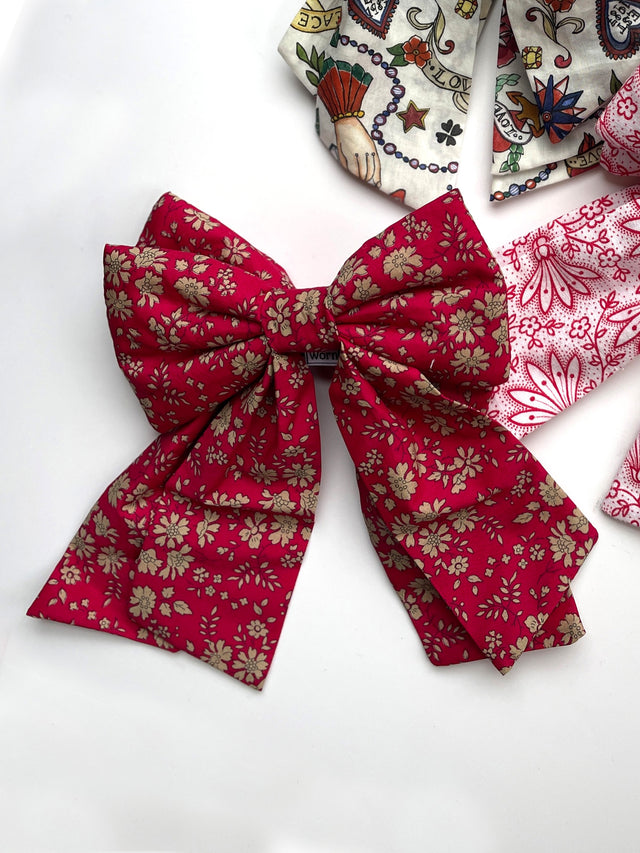 red floral bow on table