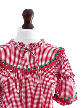 close-up of neckline and  trim on The Lucy Top in red gingham fabric