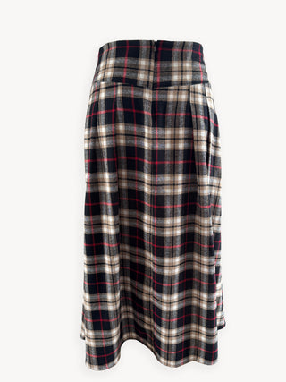 Plaid skirt with a pattern of black, white, and red on a white background