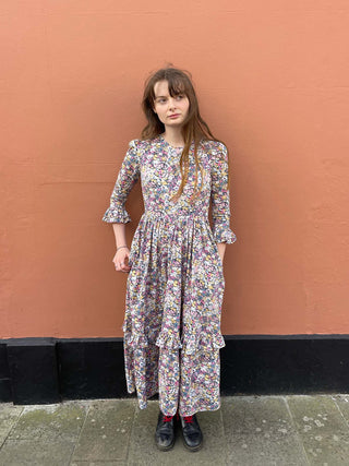 women wearing floral print midi dress