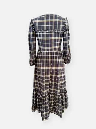 Plaid dress with long sleeves on a white background