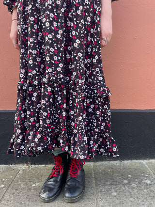 women wearing floral ruffle dress skirt detail