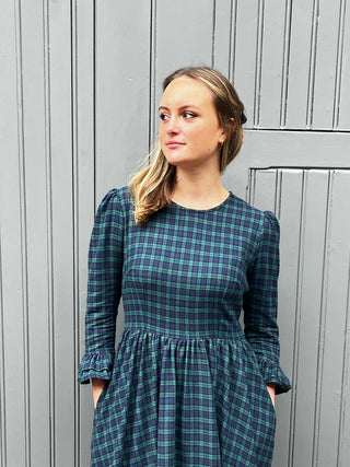 close up women wearing tartan dress