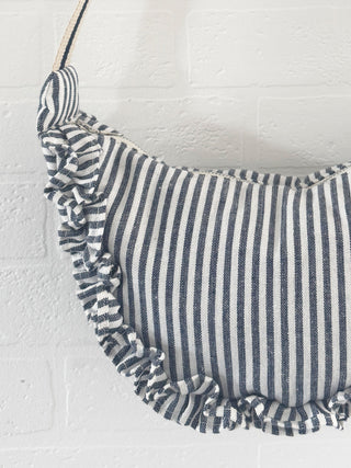 Striped bag with ruffled edge on a white background