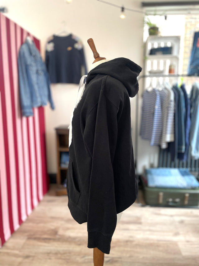 The Well Worn hooded sweatshirt on mannequin side