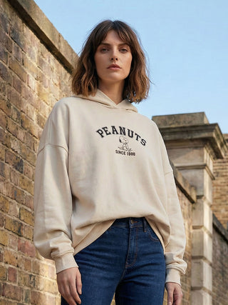 women wearing snoopy sweatshirt