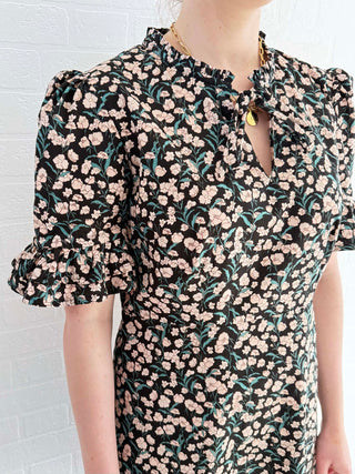 Deadstock floral cotton mini dress designed by The Well Worn for a bold, feminine look.