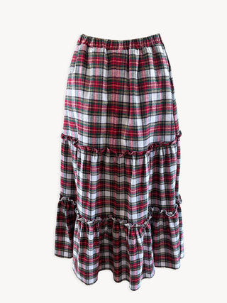 Plaid skirt with ruffled layers on a white background