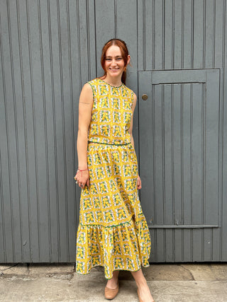 women wearing lemon print skirt    