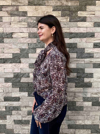 side view of women wearing pussy blouse paisley blouse made in winchester