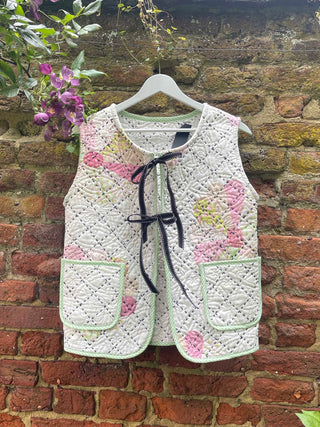 quilted waistcoat on wall