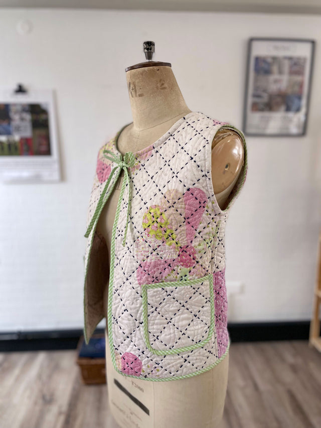 The Well Worn quilted waistcoat mannequin with tie