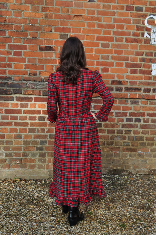 back view of red check dress