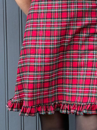 women wearing tartan mini dress detail