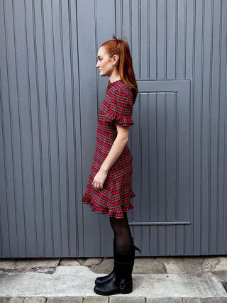 women wearing tartan mini dress side

