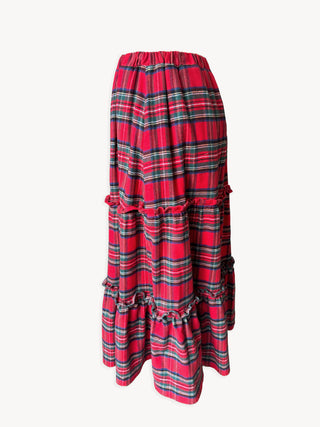 Red and black plaid skirt on a white background