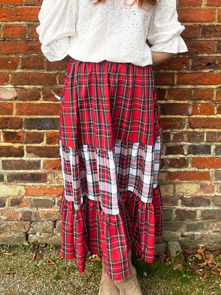 front women wearing mixed tartan skirt