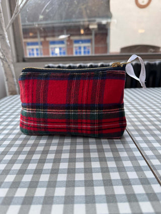 Red plaid pouch on a checkered tablecloth