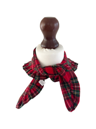 Red plaid scarf on a mannequin with a white background