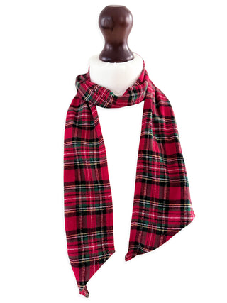Red and black plaid scarf on a mannequin with a white background