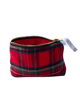Red plaid pouch with gold zipper on a white background