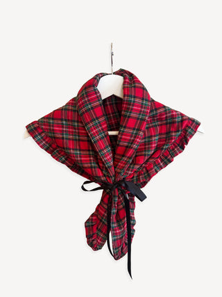 Red and black plaid scarf on a white background