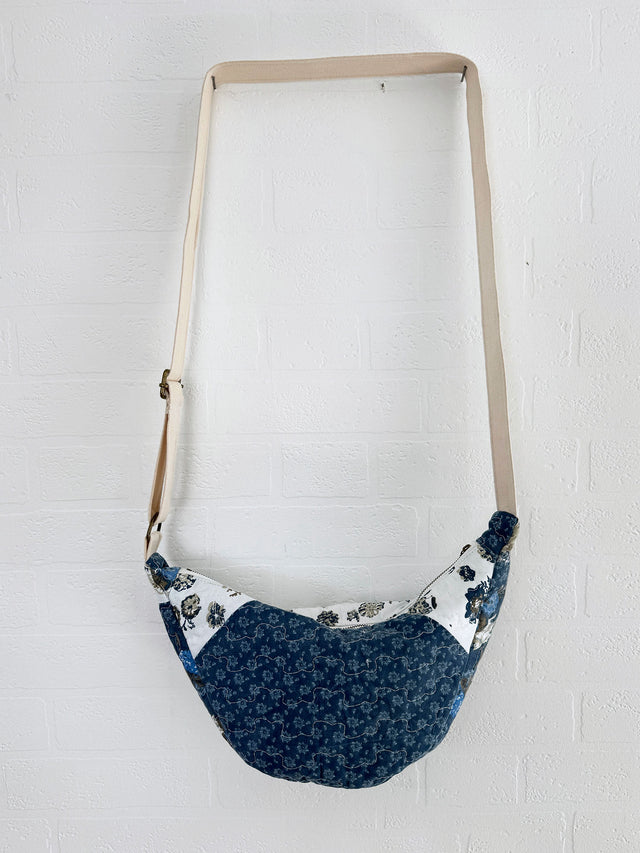 The Well Worn quilted bag hanging on wall