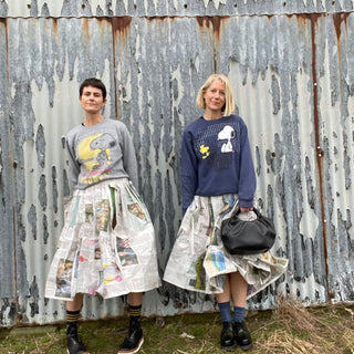 women wearing upcycled sweatshirts 
